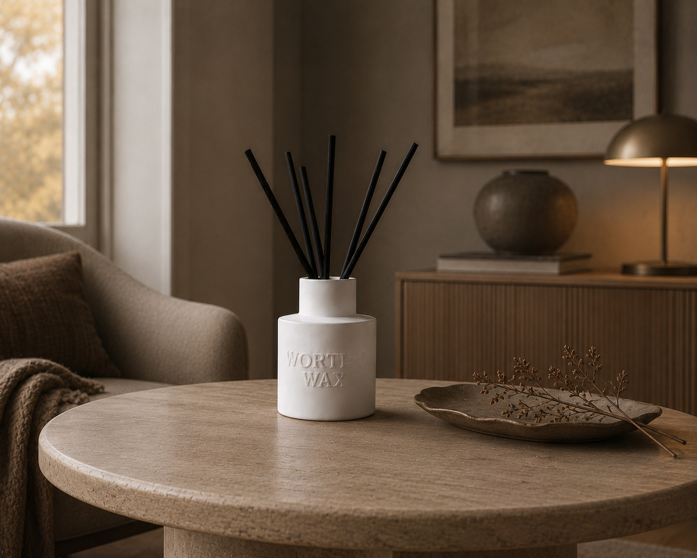 The Gentleman's Study reed diffuser with black reeds in a matte ceramic Worthy Wax bottle